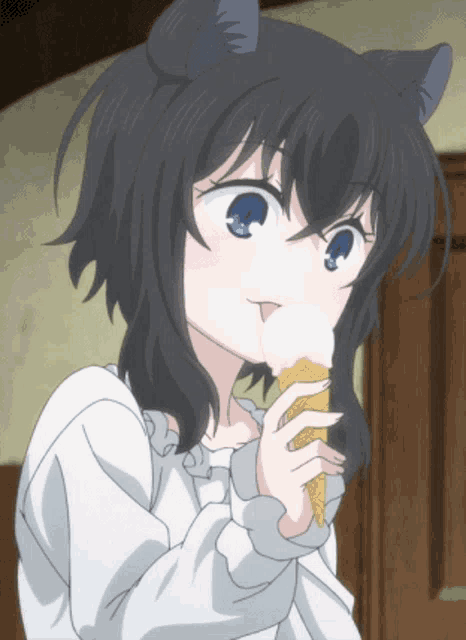 a girl with cat ears is eating ice cream