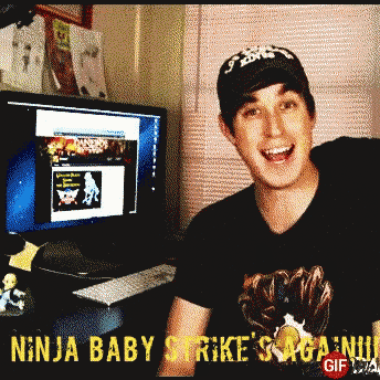 a man wearing a black shirt that says ninja baby strike 's saga ninja