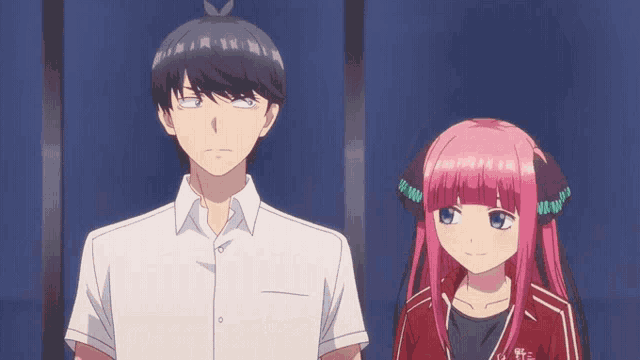 a man and a girl are standing next to each other and the girl is holding a bottle of water and says here water