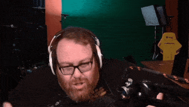 a man wearing headphones and a shirt that says cyberpunk on it