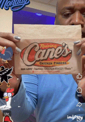 a man is holding up a cane 's chicken fingers sticker