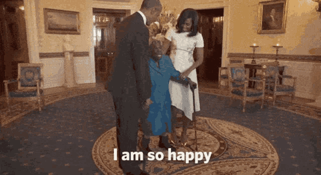 a man and woman standing next to a woman with a cane and the words " i am so happy " on the bottom
