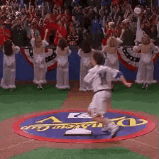 a boy wearing a jersey with the number 14 on it