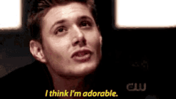 a man says " i think i 'm adorable " in a close up of his face