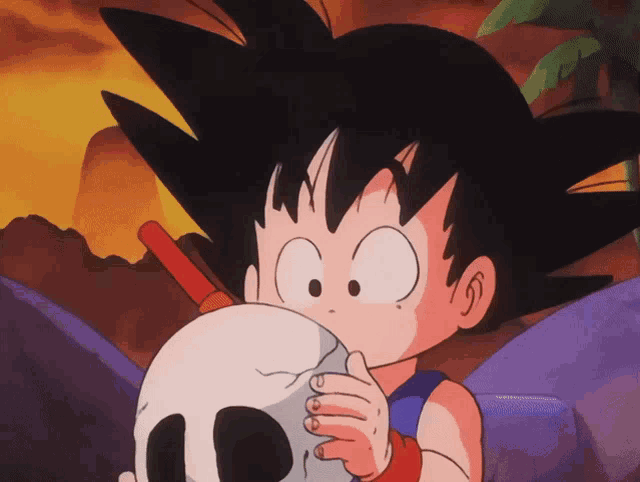 a cartoon of a boy holding a skull in his hand