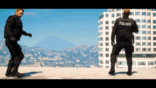 two police officers are dancing on a rooftop in front of a building