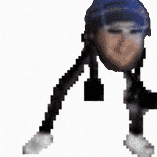 a pixelated image of a person with a blue hat and goggles
