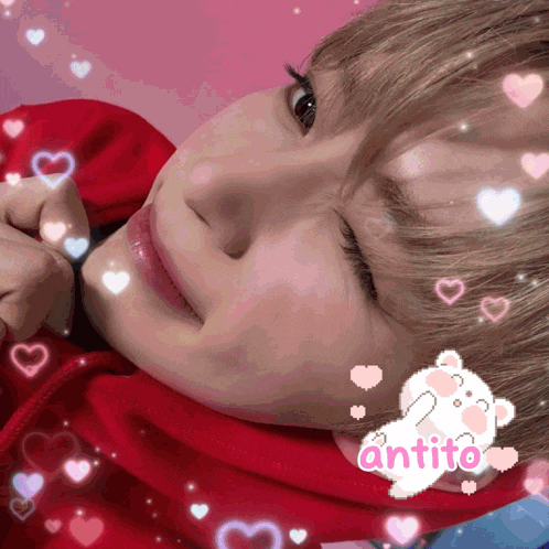 a picture of a person with hearts and the word antito on their face