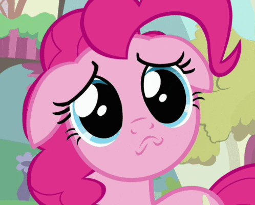 a pink pony with a sad look on its face