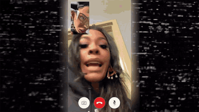 a woman is on a video call with another person