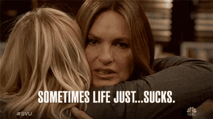 two women hugging with the words sometimes life just sucks