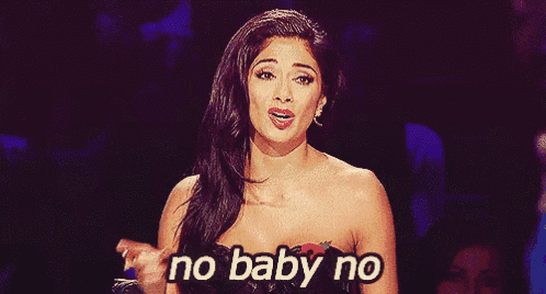 a woman says " no baby no " in front of a dark background