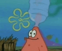 patrick star from spongebob squarepants is drinking water from a water bottle with a flower in the background .