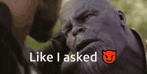 a man touching another man 's face with the words " like i asked " next to him