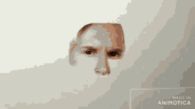 a person is drawing a man 's face with a pencil .