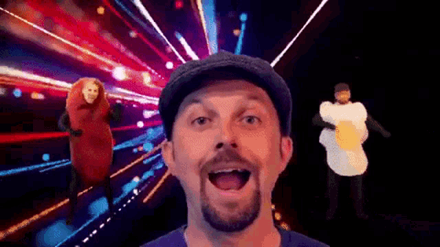 a man with a beard is wearing a hat and a costume of a sausage and an egg .