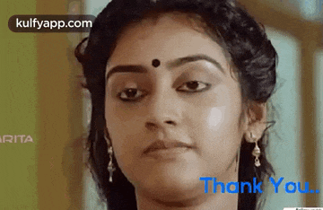 a close up of a woman 's face with the words thank you on the bottom