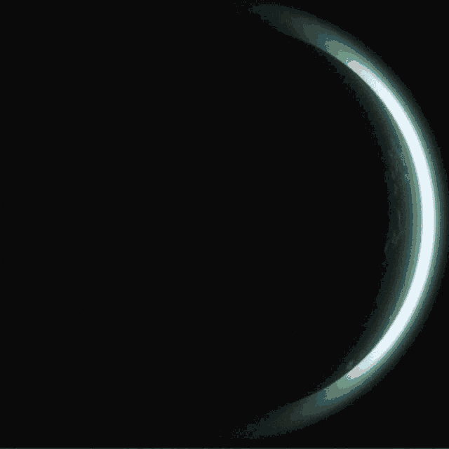 a drawing of a crescent moon with a blue and black background