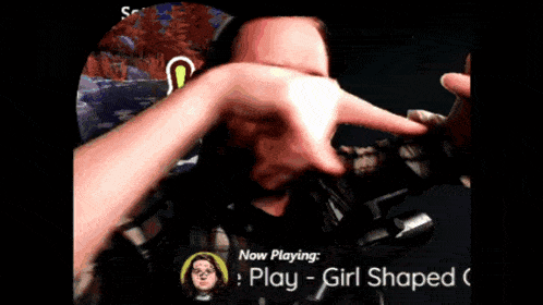 a man is playing a video game called play girl shaped