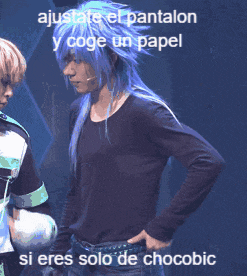 a man with long blue hair is standing next to another man with blonde hair