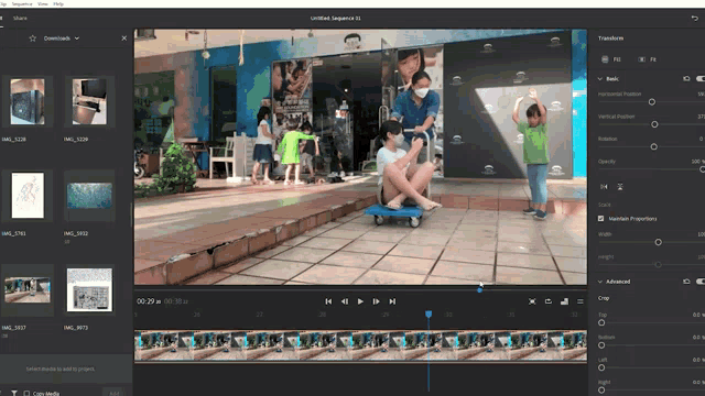 a computer screen shows a person riding a skateboard in front of a building