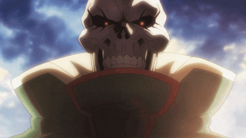 a close up of a skeleton with red eyes and sharp teeth