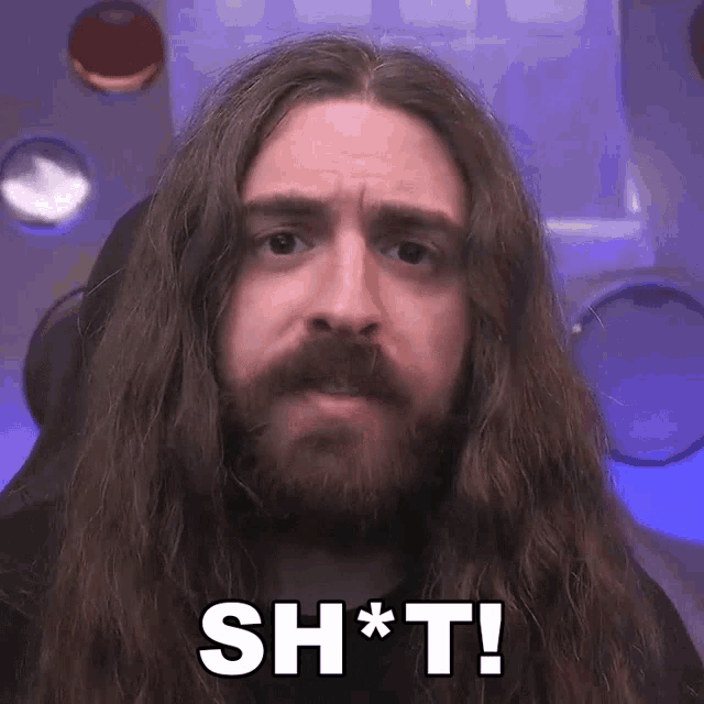 a man with long hair and a beard says sh * t !