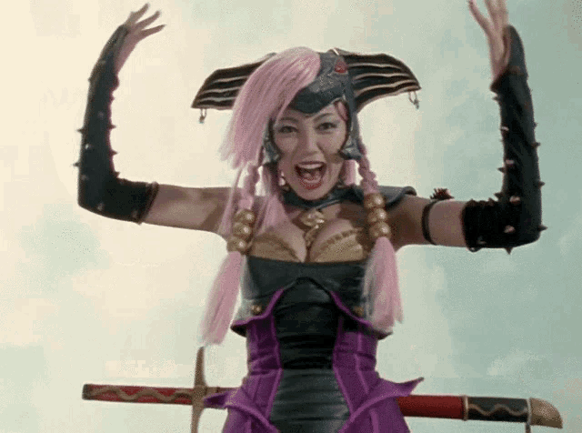 a woman with pink hair is holding a sword and screaming