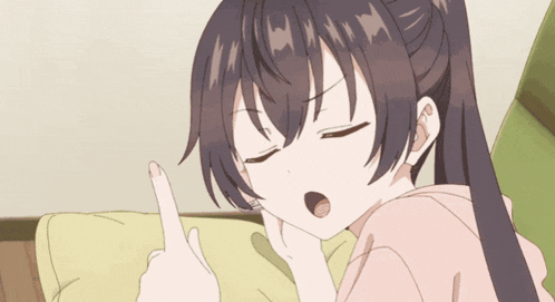 a girl with a ponytail is making a middle finger gesture