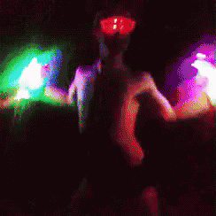 a pixelated image of a woman wearing sunglasses and dancing