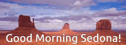a sign that says good morning sedona in front of a desert landscape