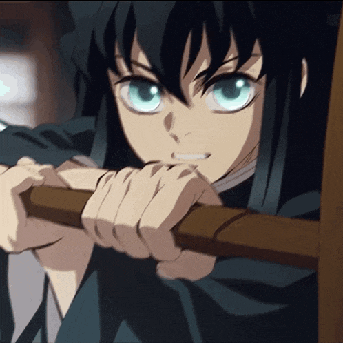 a close up of a person with blue eyes holding a stick