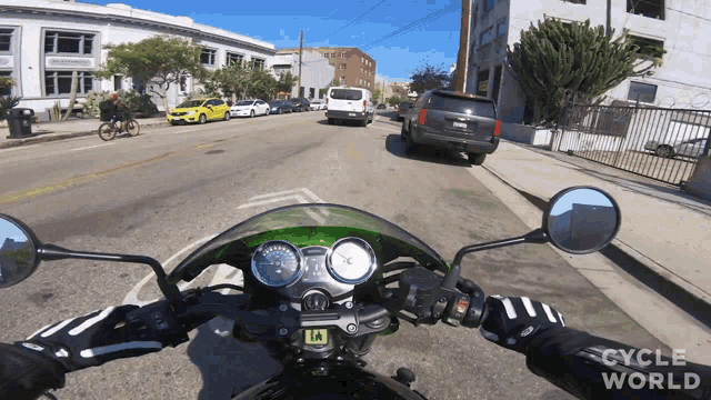 a person riding a motorcycle with a license plate that says la