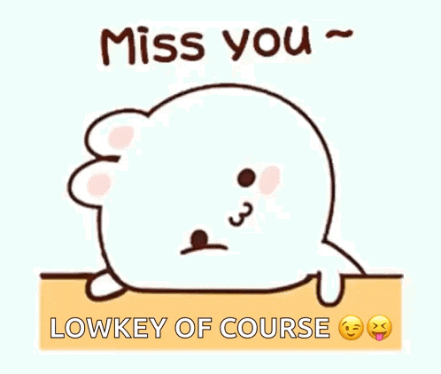a cartoon seal is laying on the ground with the words `` miss you '' written on it .
