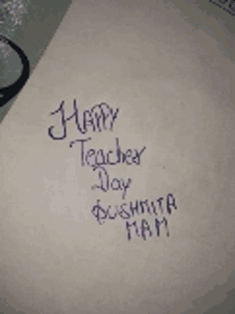 a piece of paper with the words happy teacher day on it