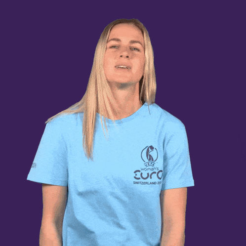 a woman wearing a blue shirt that says uefa women 's euro on it