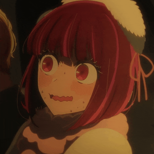 a girl with red hair is wearing a hat and scarf