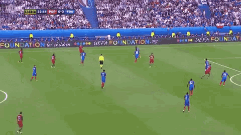 a soccer game is being played on a field sponsored by the uefa foundation for children ..