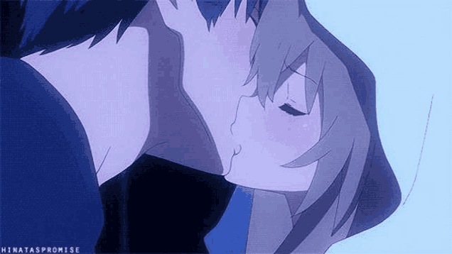 a man and a woman are kissing each other in a purple anime scene .