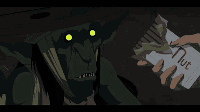 a cartoon drawing of a monster holding a box that says nut