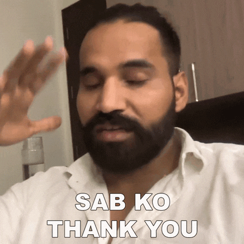 a man with a beard and a white shirt says sab ko thank you