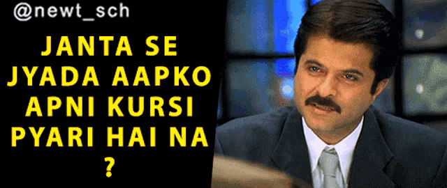 a man with a mustache next to a sign that says janta se jyada aapko apni kursi pyari hai na