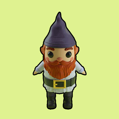 a figurine of a gnome with a beard and hat
