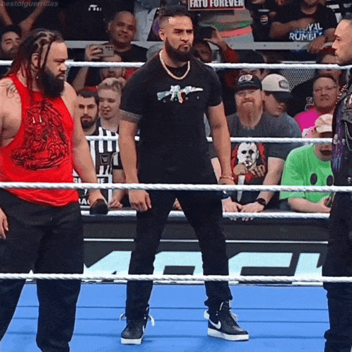 a wrestler wearing a shirt that says fate forever