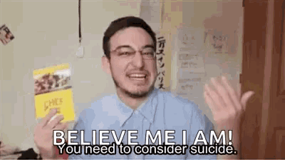 a man is holding a book and saying believe me i am