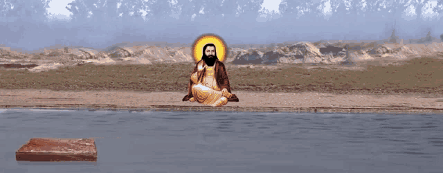 a man with a beard sits in a lotus position in front of a lake