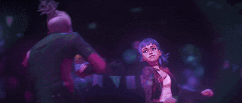 a man and a woman are standing next to each other on a stage in a video game .