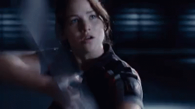 Right Through The Apple GIF - Thehungergames Hungergames Right GIFs