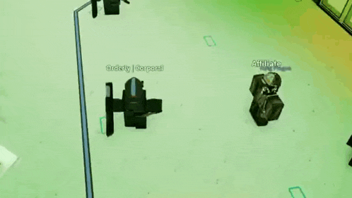 a group of people are playing a video game and one of them is holding a gun .