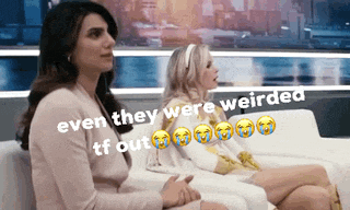 two women are sitting on a couch with the words even they were weird tf out
